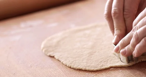 Easter cookies making, cutting bunny shape, close-up, steadicam Stock Footage 104290329
