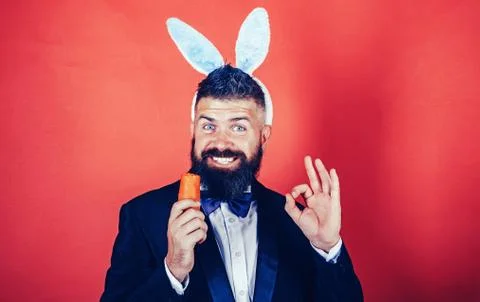 Easter copy space. Easter man with carrot. Happy spring holiday and easter Stock Photos
