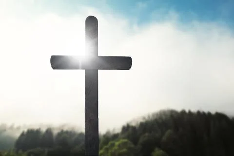 Easter cross on the dawn background 스톡 사진