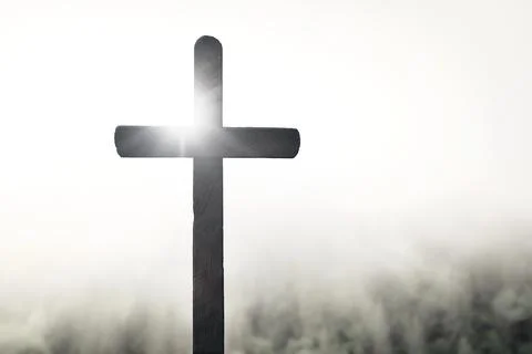 Easter cross on the dawn background Stock Photos
