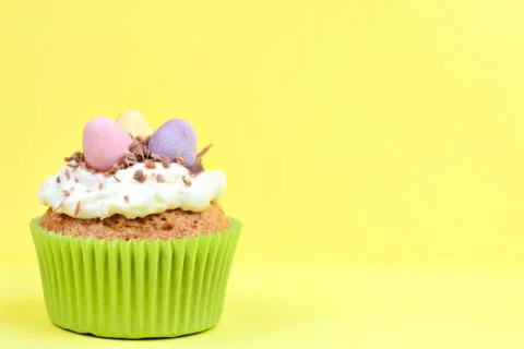 Easter cupcake with chocolate eggs Stock Photos