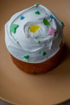 Easter cupcake on a plate. Easter, cupcake, holiday. Plate with easter cupcak Stock Photos