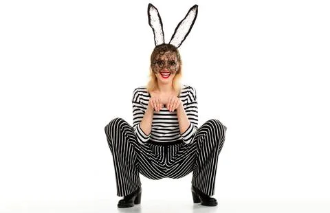 Easter day celebration. Sexy Easter bunny girl. Smiling blonde woman in bla.. Stock Photos