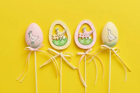 Easter decor in the form of eggs on a yellow background Stock-Fotos