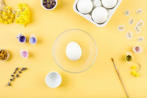 Easter decorated eggs on yellow background. Minimal happy easter concept. Top Stock Photos