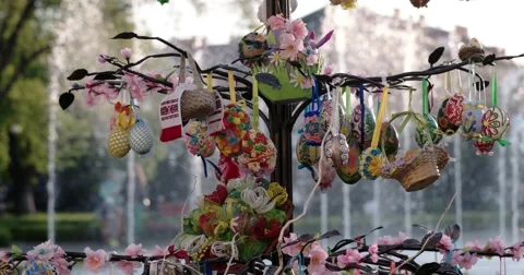 Easter Decorated Tree With Fountain on the Background Stock Footage 64174093