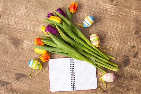 Easter decoration and blank notebook Stock Photos