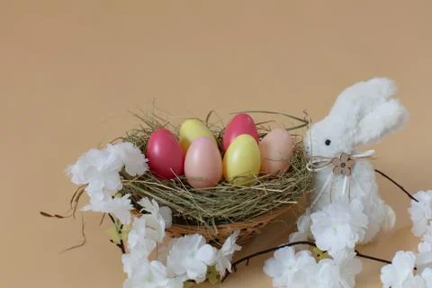 Easter decoration with colored eggs and white bunny Stock Photos