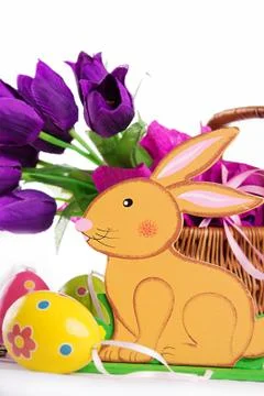 Easter decoration with rabbit, eggs and tulips Stock Photos