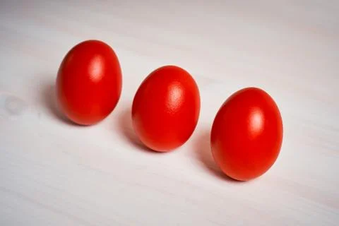 Easter decoration with three red eggs Stock Photos