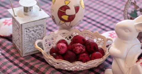 Easter decorations featuring colorful eggs, a cute bunny, and spring home d.. Stock Photos