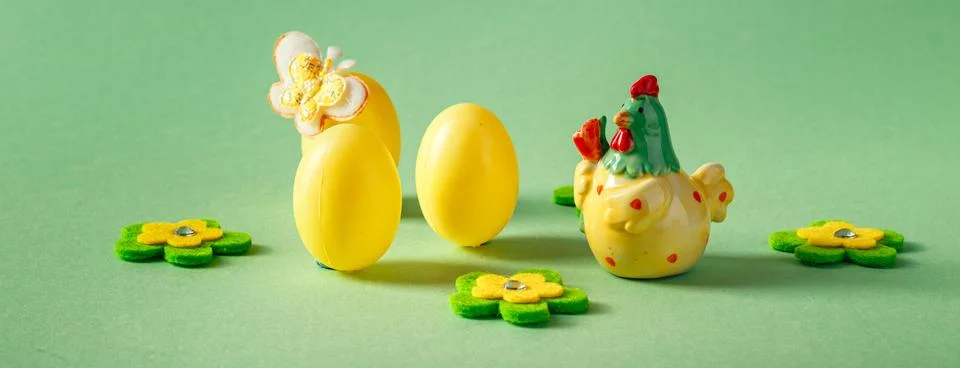 Easter decorations in the form of decorative eggs and a ceramic chicken Stock Photos