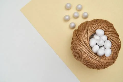 Easter decorative eggs in the nest. Decorative element for the holiday with Stock Photos