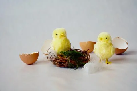 Easter decorative figures of chicks and nest made from twigs Stock Photos