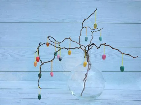 Easter dekorative eggs on tree branches. Stock Photos