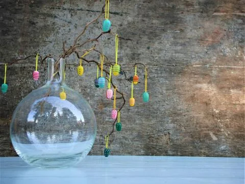 Easter dekorative eggs on tree branches. Stock Photos