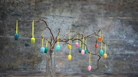 Easter dekorative eggs on tree branches. Stock Photos