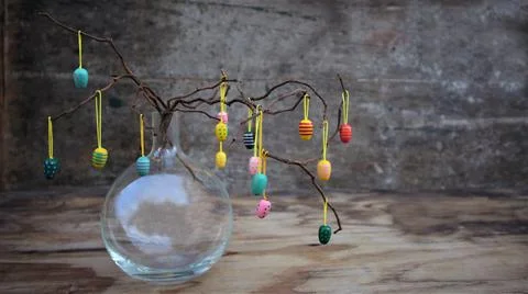 Easter dekorative eggs on tree branches. Stock Photos