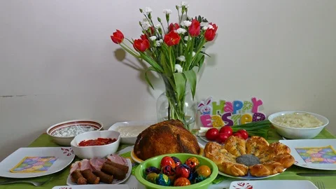 Easter dinner with food on dining table, Holiday meal with meat and potatoes Stock Footage 98319756