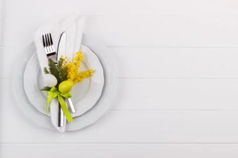 Easter dinner table setting Stock Photos
