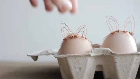 Easter DIY egg, made in bunny style. Minimal Easter concept Stock Footage 105871212