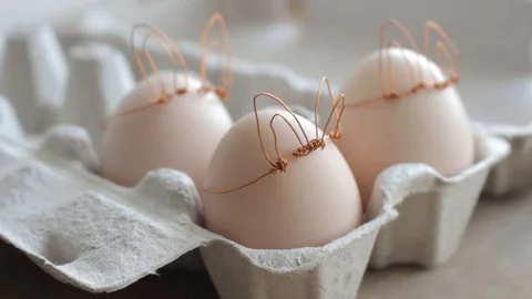 Easter DIY egg, made in bunny style. Minimal Easter concept Stock Footage 105871227