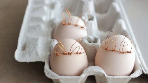 Easter DIY egg, made in bunny style. Minimal Easter concept Stock Footage 105871348