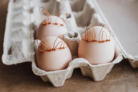 Easter DIY egg, made in bunny style. Minimal Easter concept, idea with rabbit Foto stock