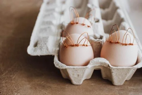 Easter DIY egg, made in bunny style. Minimal Easter concept, idea with rabbit Stock Photos