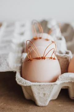 Easter DIY egg, made in bunny style. Minimal Easter concept, idea with rabbit Foto stock