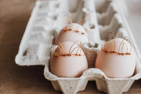 Easter DIY egg, made in bunny style. Minimal Easter concept, idea with rabbit Foto stock