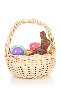 Easter: Easter Basket With Chocolate Bunny And Plastic Eggs Stock Photos