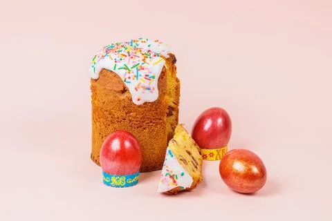 Easter. Easter cakes with eggs and bunny ears on a pink background. Easter. Stock Photos