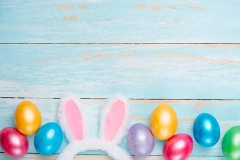 Easter, Easter colored eggs, with Easter hares. Top view, Flat lay Stock Photos