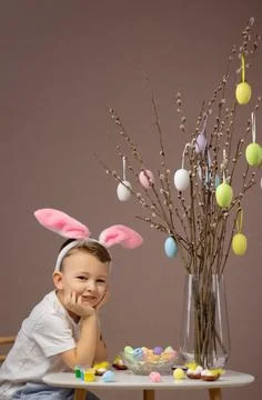 Easter. Easter concept. Boy decorate home for Easter holiday. 写真素材