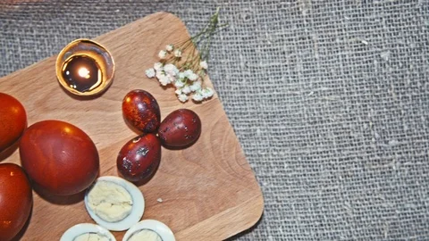 Easter, Easter eggs and bread are on the Board Stock Footage 73438248