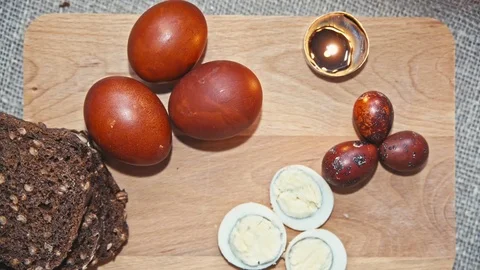 Easter, Easter eggs and bread are on the Board Stock Footage 73441833