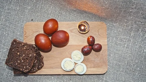 Easter, Easter eggs and bread are on the Board Stock Footage 73454843