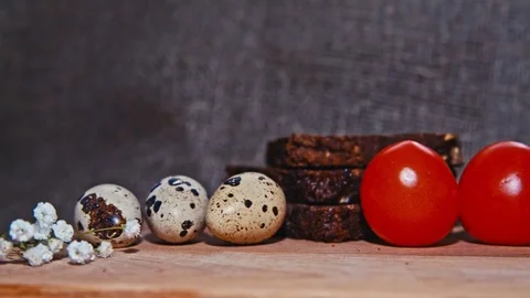 Easter, Easter eggs and broad on wooden Board Stock Footage 73434549