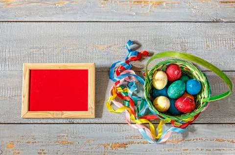 Easter, Easter eggs, basket, spring, colored ribbons, frame, cop Fotos Stock