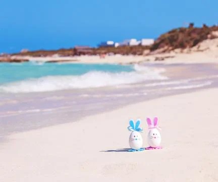 Easter, Easter eggs on the beach, ocean, sea Stock Photos