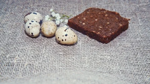 Easter, Easter eggs, bread and tomatoes Video stock 73418407