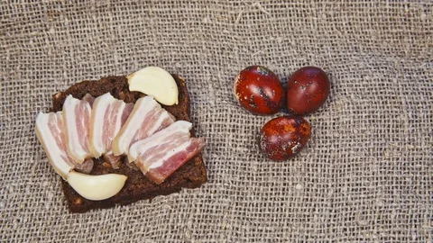 Easter, Easter eggs, bread and bacon Stock Footage 73426204