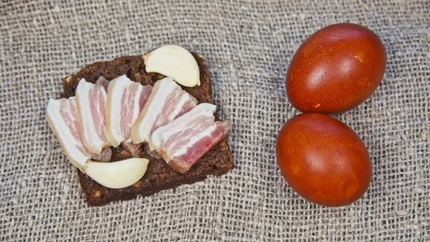 Easter, Easter eggs, bread and bacon Stock Footage 73426514