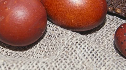 Easter, Easter eggs, bread and flowers Video stock 73440283