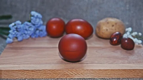 Easter, Easter eggs, potatoes and flowers 스톡 동영상 73437993
