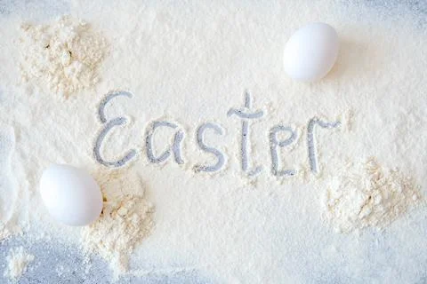 Easter. Easter inscription on flour. Easter theme. Copy space. Stock Photos