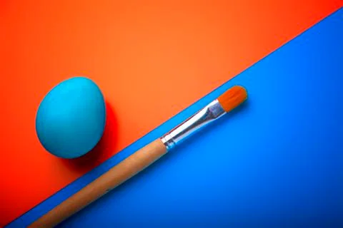 Easter egg and brush bright background,the concept of the creation of new Stock Illustration