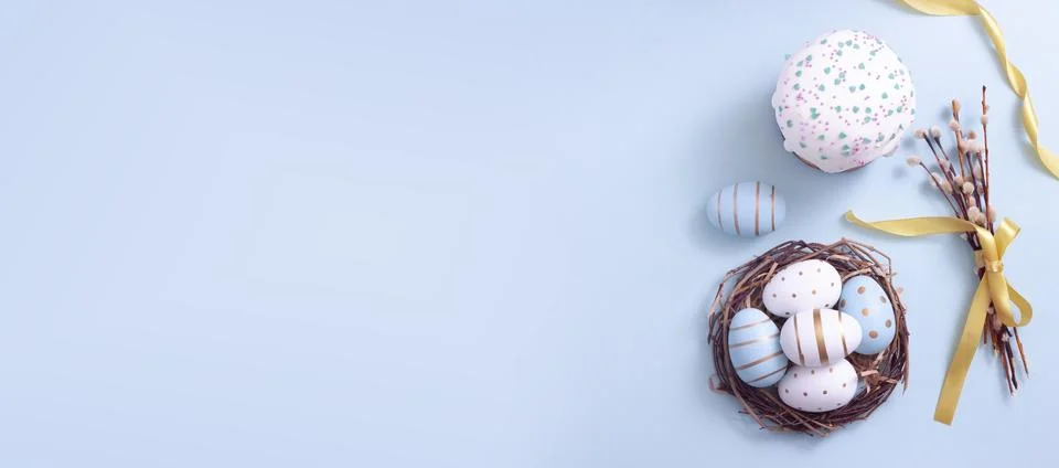 Easter egg and cake on grey table background. Stock Photos