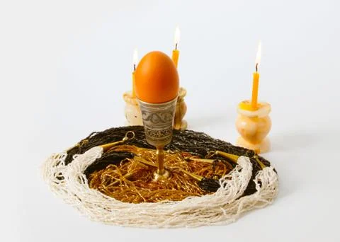 Easter egg and the flame 库存照片